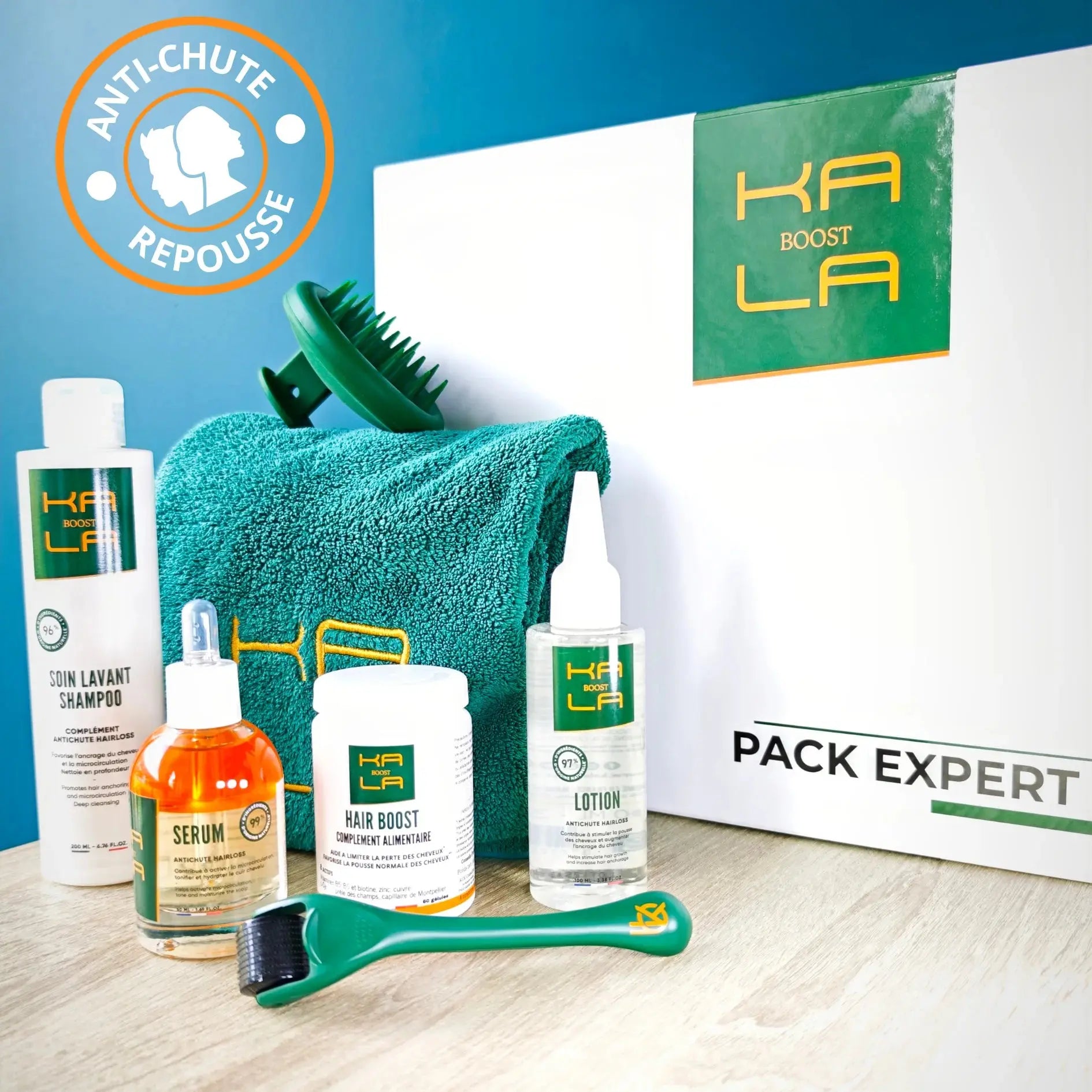 Photo du Pack Expert Kalaboost anti-chute et repousse capillaire avec shampoing, lotion, sérum, complément, dermaroller, brosse et serviette.