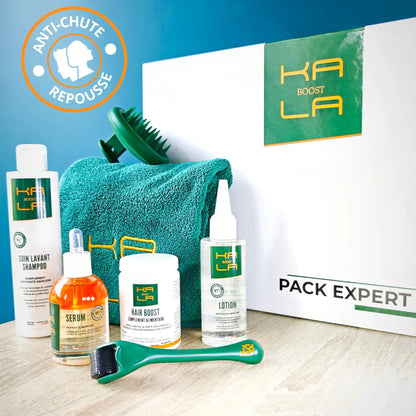 Photo du Pack Expert Kalaboost anti-chute et repousse capillaire avec shampoing, lotion, sérum, complément, dermaroller, brosse et serviette.